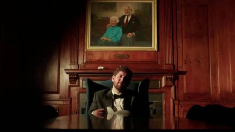 Still from Cabot House's 2025 Housing Day video with a student posing as the "Quad Father.".
