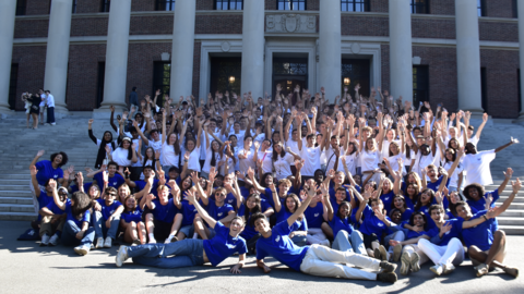 FIP students taking a group picture on the Widener Library steps