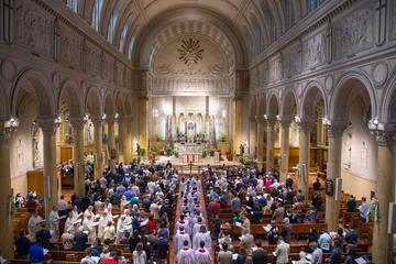 A photo of a catholic mass in progress at the St. Paul’s Catholic Church.