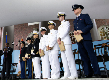ROTC students on stage during the Harvard/MIT ROTC Commissioning ceremony in Tercentenary Theatre.