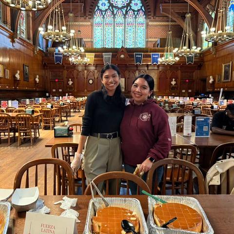 2 students at Harvard Foundation Food Festival.