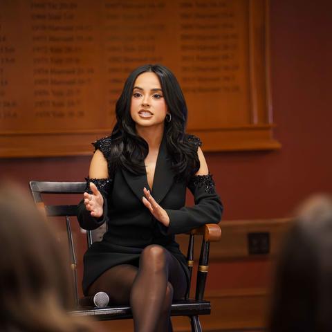 Cultural Rhythms honoree, Becky G, speaks to student organizers during the meet-and-greet.