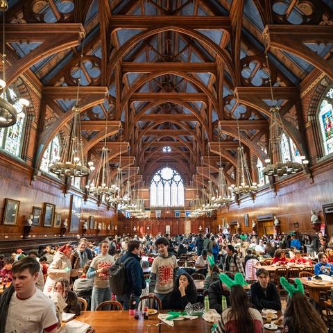 Wide shot of Annenberg Dining Hall on Housing Day after first-year students get their residential assignments.