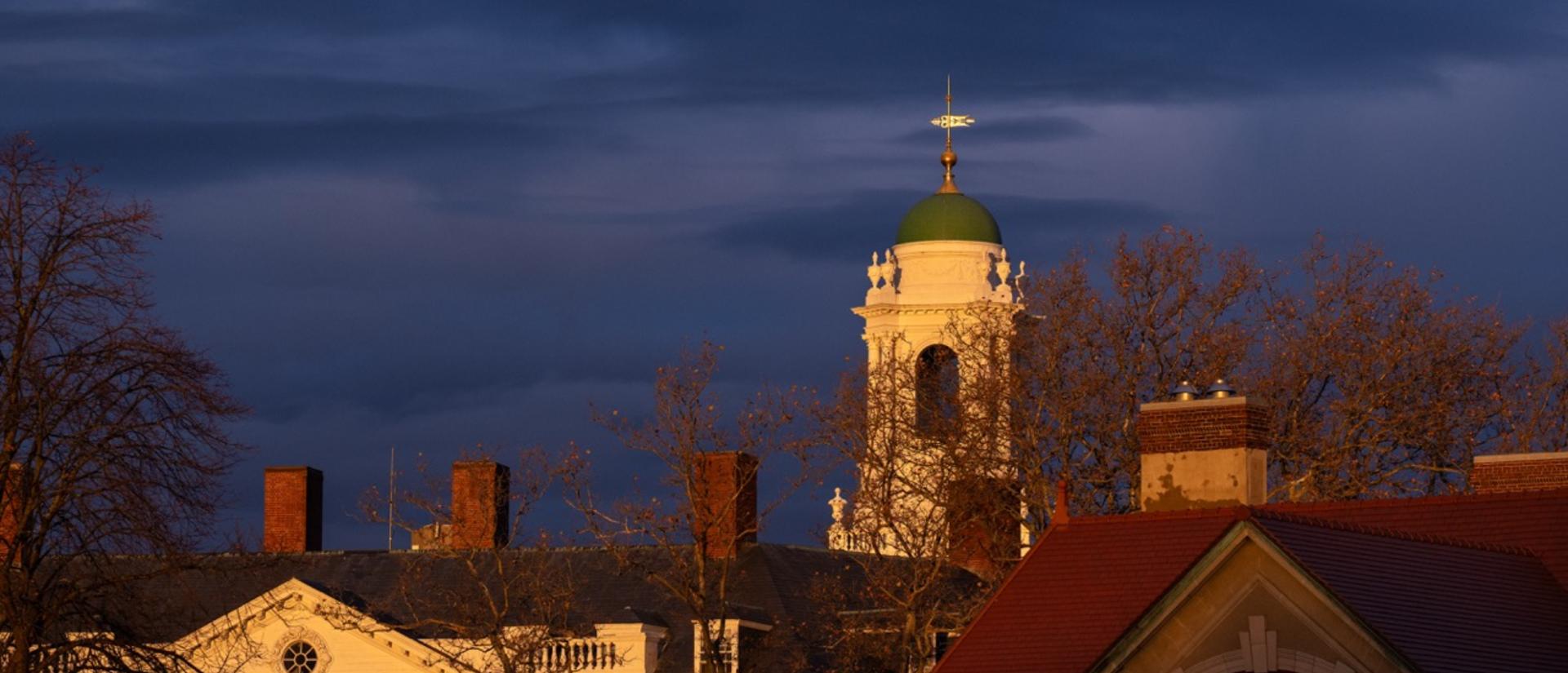 Eliot House in the distance while the sun sets.