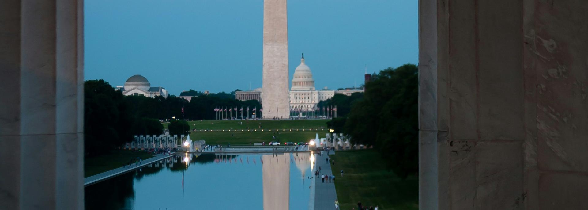 Photograph of Washington, D.C., featuring the Washington Monument and the U.S. Capitol.