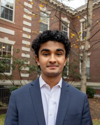 A headshot of Tirth Dave.