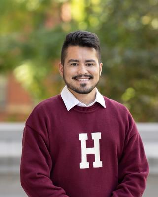 A headshot of Hugo Cardona.