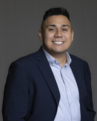 A headshot of Armando Olea Romero.