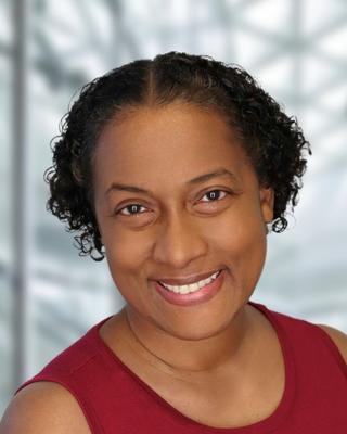 A headshot of Kara-Sue Sweeney.