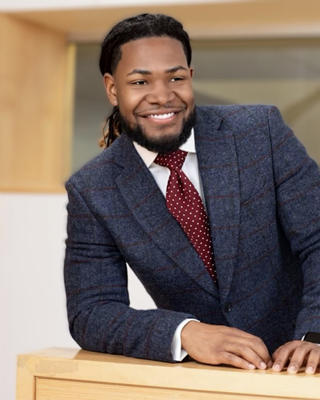 A headshot of Aric B. Flemming, Jr.