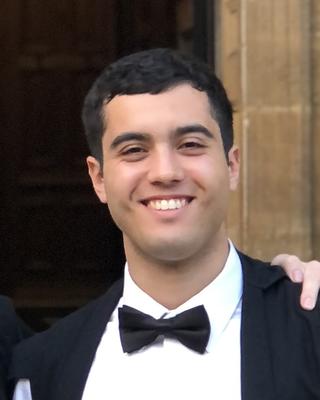 A headshot of Ryan Safiry.