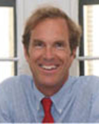 A headshot of Tom Dingman.