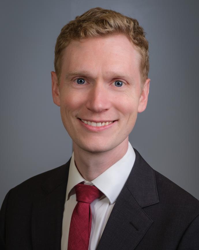 A headshot of John Nowak.