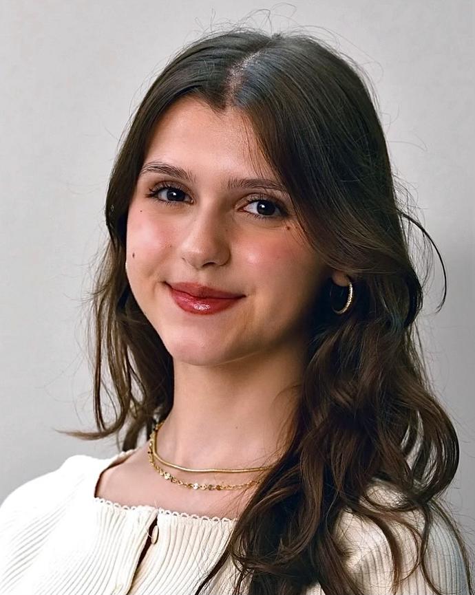 A headshot of Dea Kamberi.