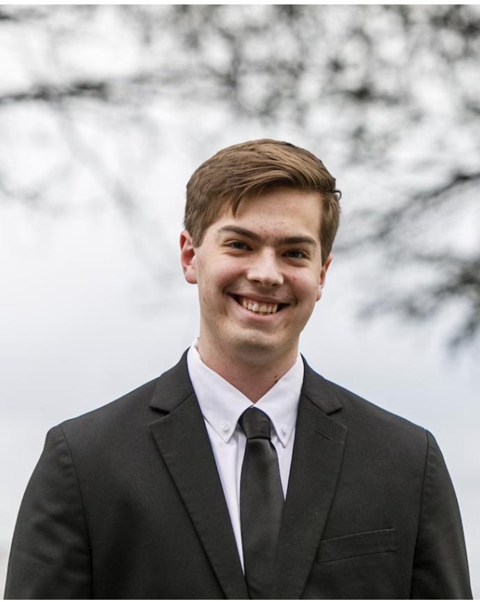 A headshot of Caleb Masshardt.